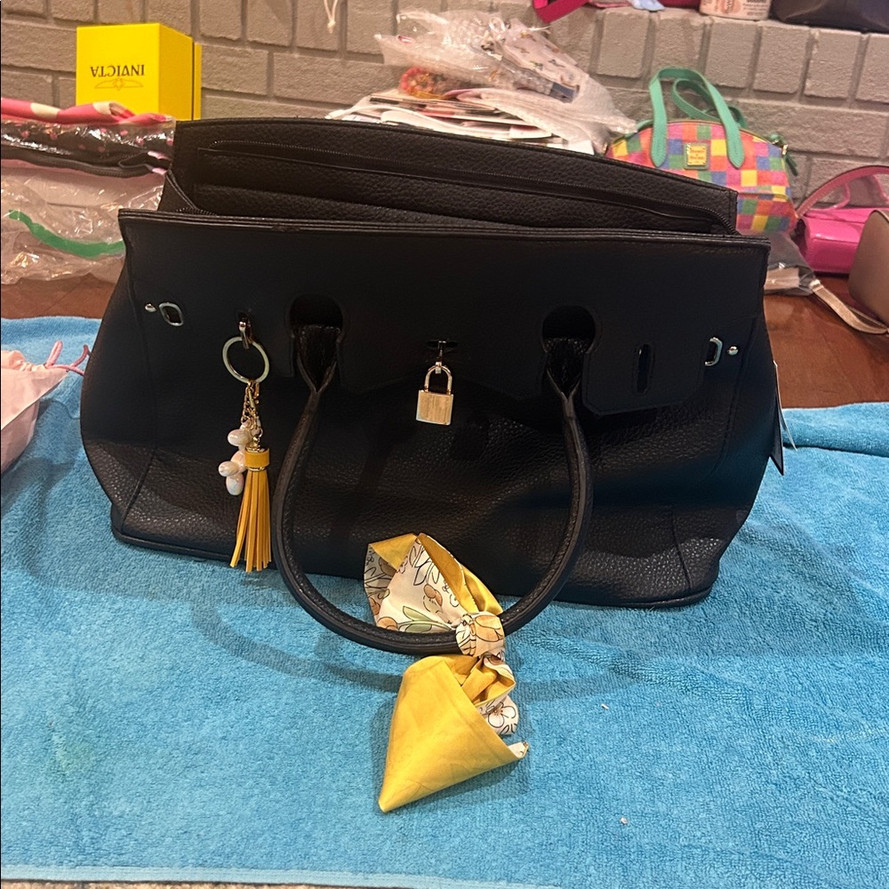 Elegant Black Satchel with Yellow Floral Charm